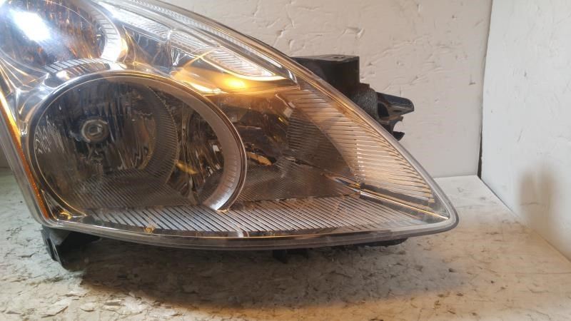 Right headlamp assembly composite used genuine OEM Nissan Altima 2010-2012