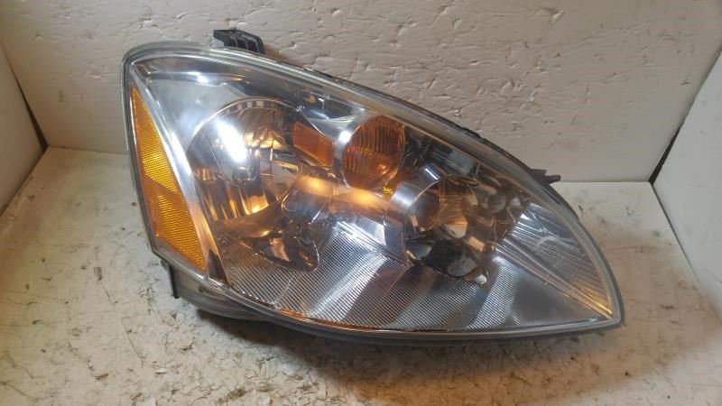 Right headlamp assembly composite used genuine OEM Nissan Altima 2005-2006