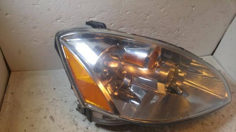 Right headlamp assembly composite used genuine OEM Nissan Altima 2005-2006