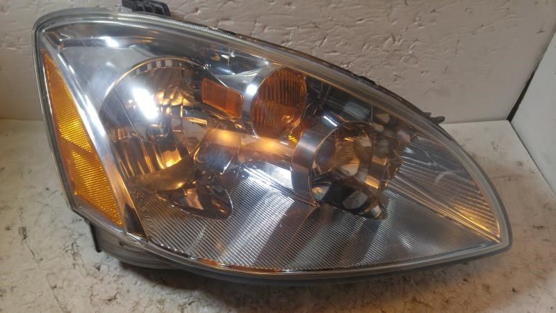 Right headlamp assembly composite used genuine OEM Nissan Altima 2005-2006