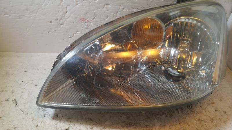 Faro izquierdo usado original (OEM) Nissan Altima 2002-2004