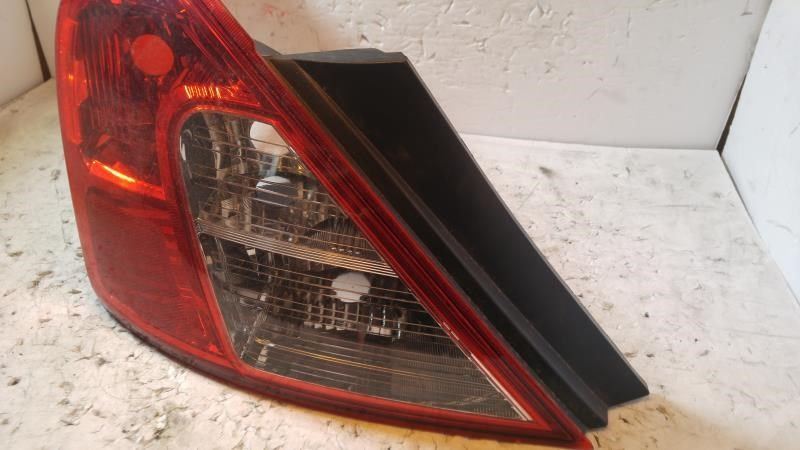 Right taillamp assembly used genuine OEM Nissan Versa 2012-2019