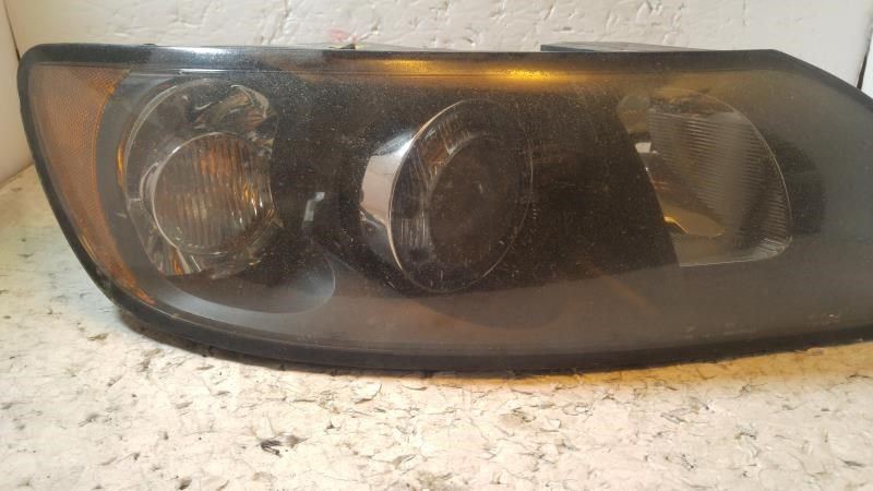 Headlamp Assembly used genuine OEM Volvo Volvo 40 Series 2004-2007