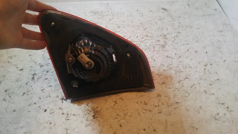 Left taillamp assembly inner used genuine OEM Toyota Corolla 2009-2010