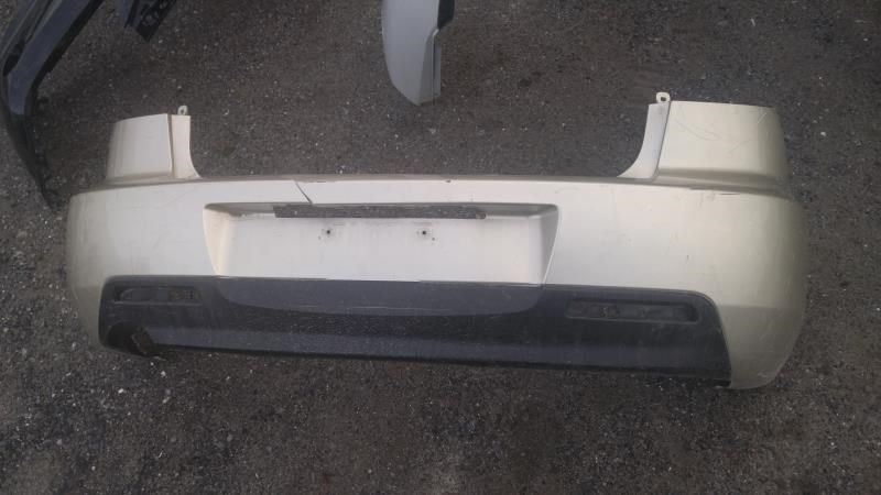 Rear bumper cover used genuine OEM Mazda 3 2004-2006