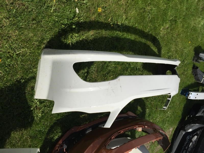 Front bumper cover used genuine OEM Dodge Grand Caravan 2011-2020