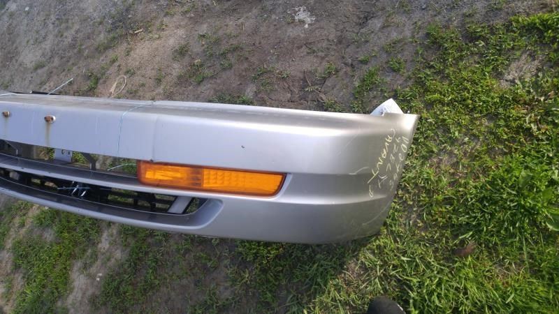 Front bumper cover used genuine OEM Acura EL 1997-2000