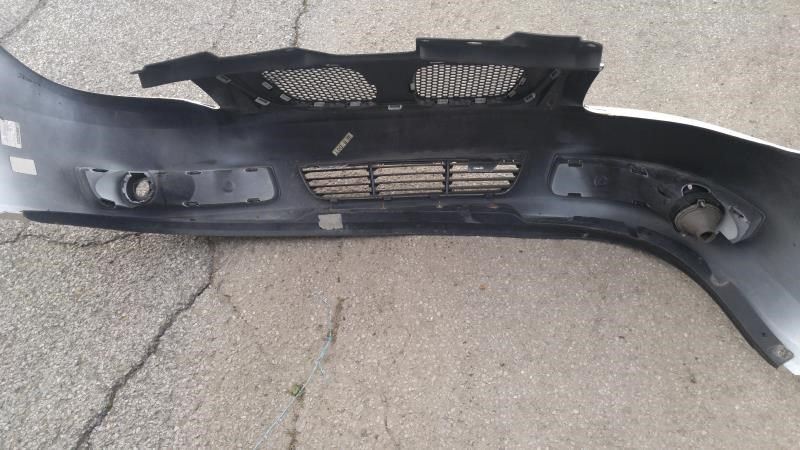 Front bumper cover used genuine OEM Pontiac G5 2008-2010