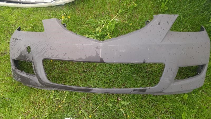 Front bumper cover used genuine OEM Mazda 3 2007-2009