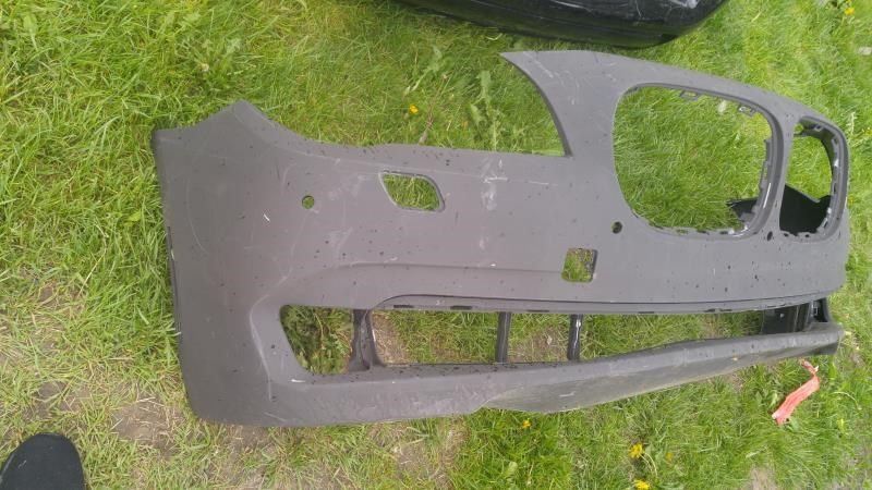 Front bumper cover used genuine OEM BMW 750I 2009-2012