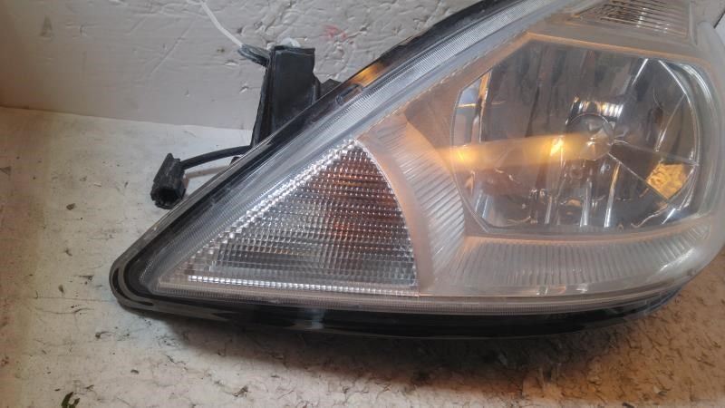Left headlamp assembly composite used genuine OEM Nissan Versa 2007-2012