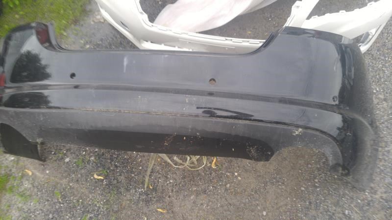 Rear bumper cover used genuine OEM Jaguar XF 2010-2011
