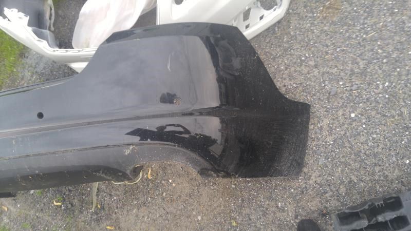 Rear bumper cover used genuine OEM Jaguar XF 2010-2011
