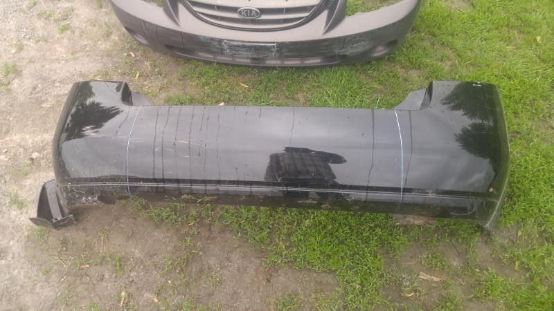 Rear bumper cover used genuine OEM Nissan Sentra 2007-2012