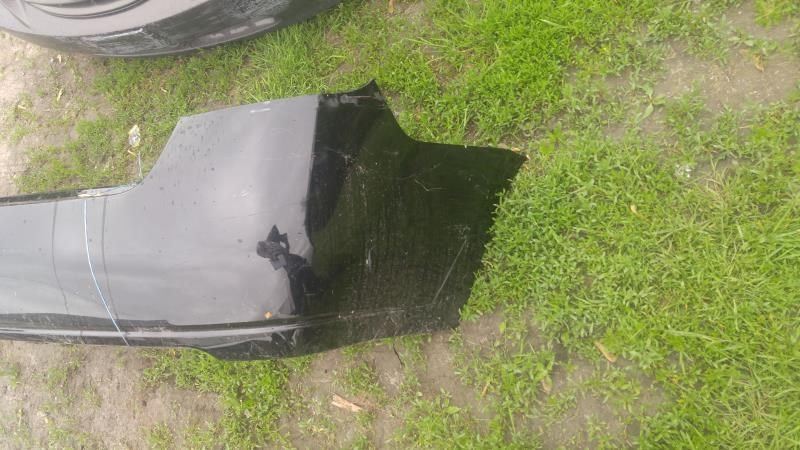 Rear bumper cover used genuine OEM Nissan Sentra 2007-2012