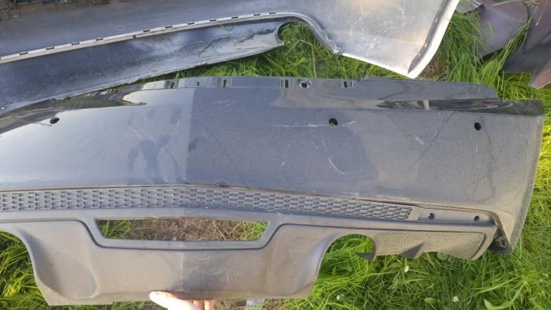 Defensa (parachoques) trasera usada original (OEM) Cadillac ATS 2013-2018