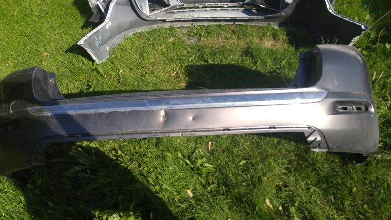 Defensa (parachoques) trasera usada original (OEM) Toyota Highlander 2011-2013