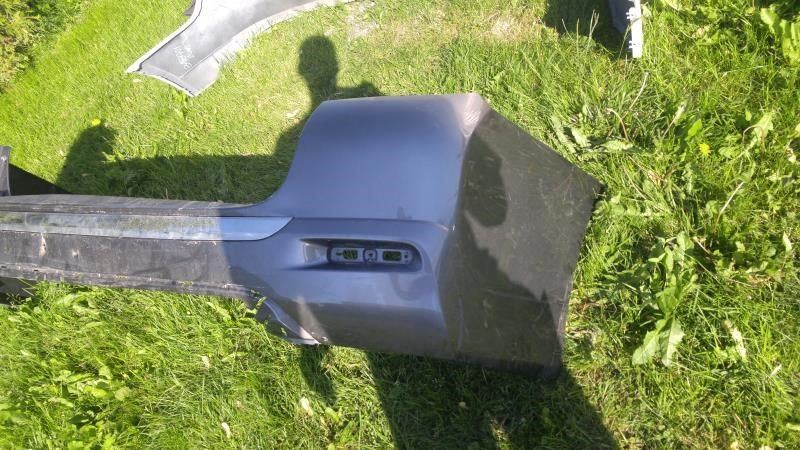 Defensa (parachoques) trasera usada original (OEM) Toyota Highlander 2011-2013