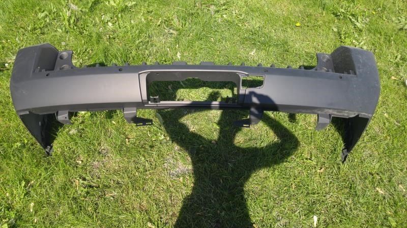 Rear bumper cover used genuine OEM Cadillac Escalade 2015-2016