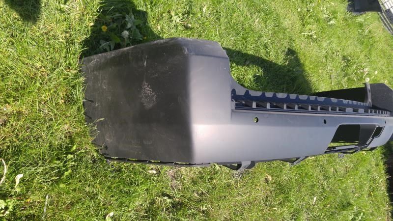 Rear bumper cover used genuine OEM Cadillac Escalade 2015-2016