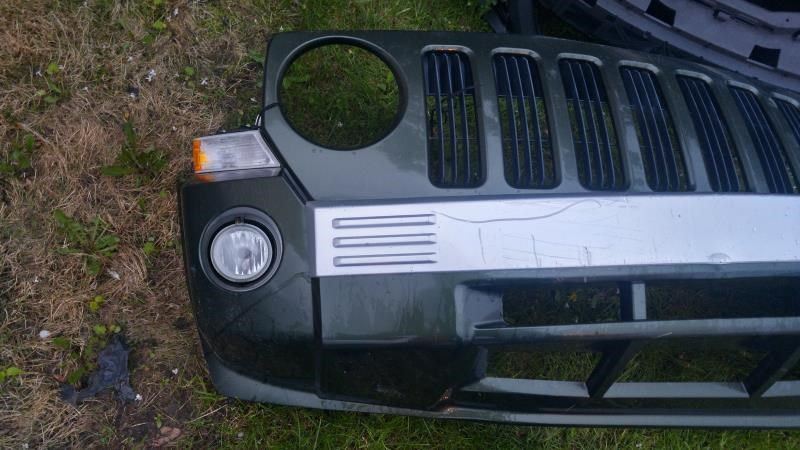 Front bumper cover used genuine OEM Jeep Patriot 2007-2010