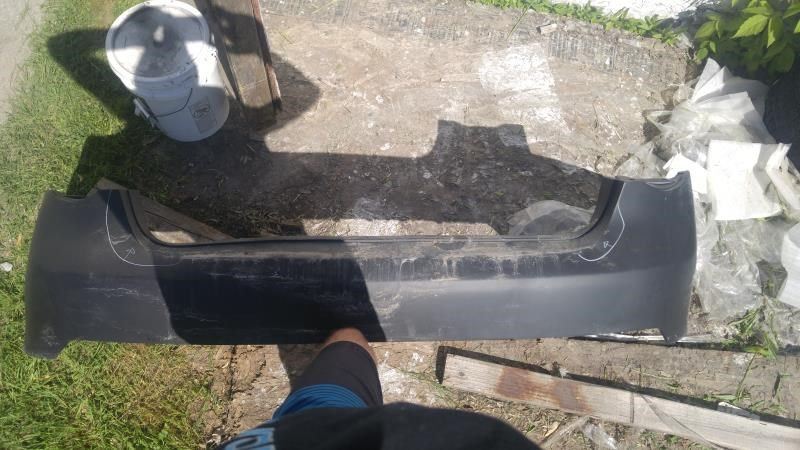 Rear bumper cover used genuine OEM Volkswagen Jetta 2005-2010