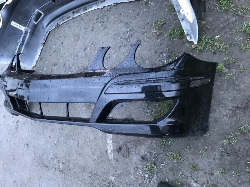 Front bumper cover used genuine OEM Mercedes-Benz E320 2007-2009