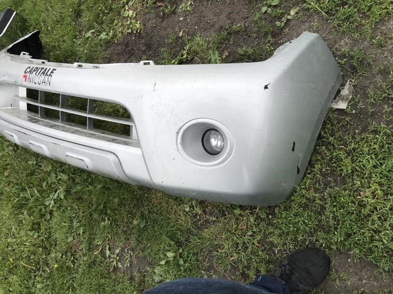 Front bumper cover used genuine OEM Nissan Pathfinder 2008-2012
