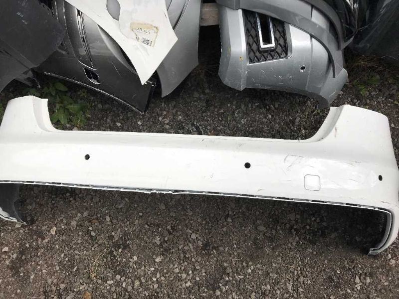 Defensa (parachoques) trasera usada original (OEM) Audi A4 2013-2016