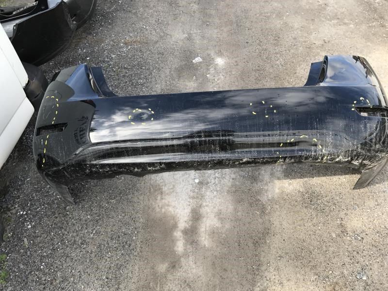 Rear bumper cover used genuine OEM Nissan Sentra 2013-2015
