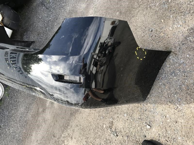 Rear bumper cover used genuine OEM Nissan Sentra 2013-2015