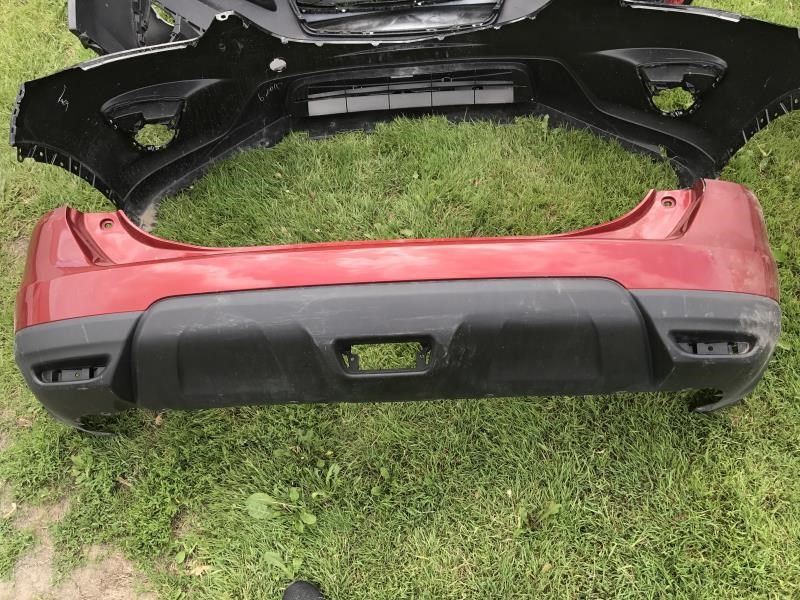 Rear bumper cover used genuine OEM Nissan Rogue 2014-2016