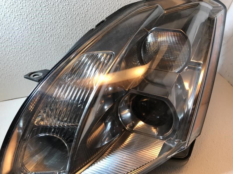 Faro izquierdo usado original (OEM) Nissan Maxima 2004