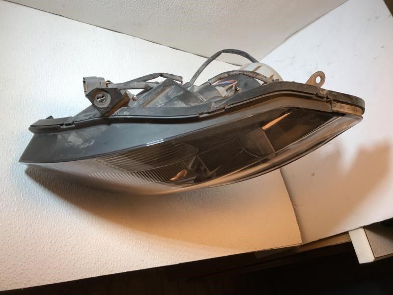 Faro izquierdo usado original (OEM) Nissan Maxima 2004
