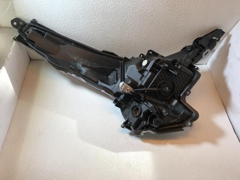 Left headlamp lens/housing used genuine OEM Toyota Prius 2016-2017