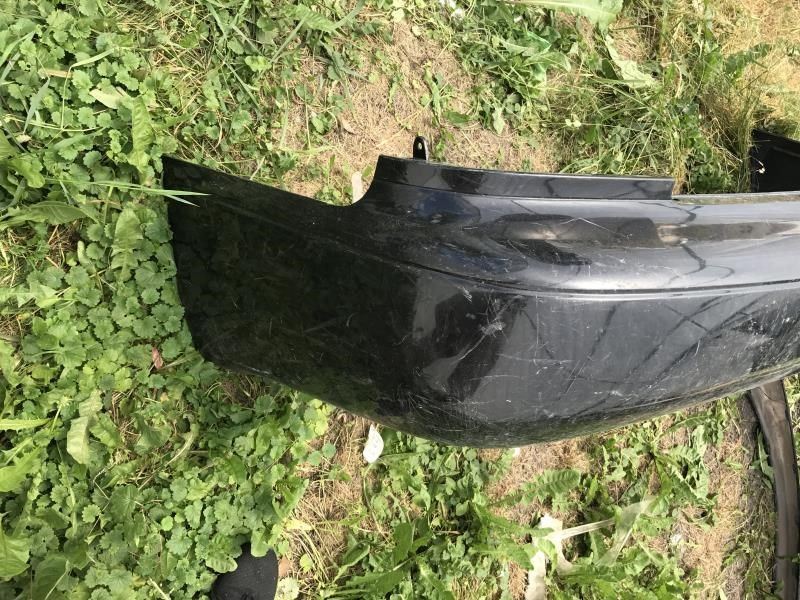 Rear bumper cover used genuine OEM Toyota Corolla 1998-2002