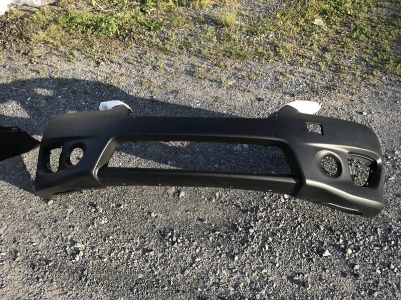 Front bumper cover used genuine OEM Nissan Sentra 2013-2015
