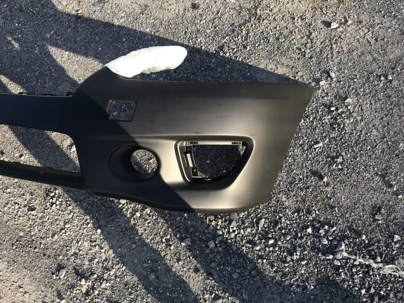Front bumper cover used genuine OEM Nissan Sentra 2013-2015