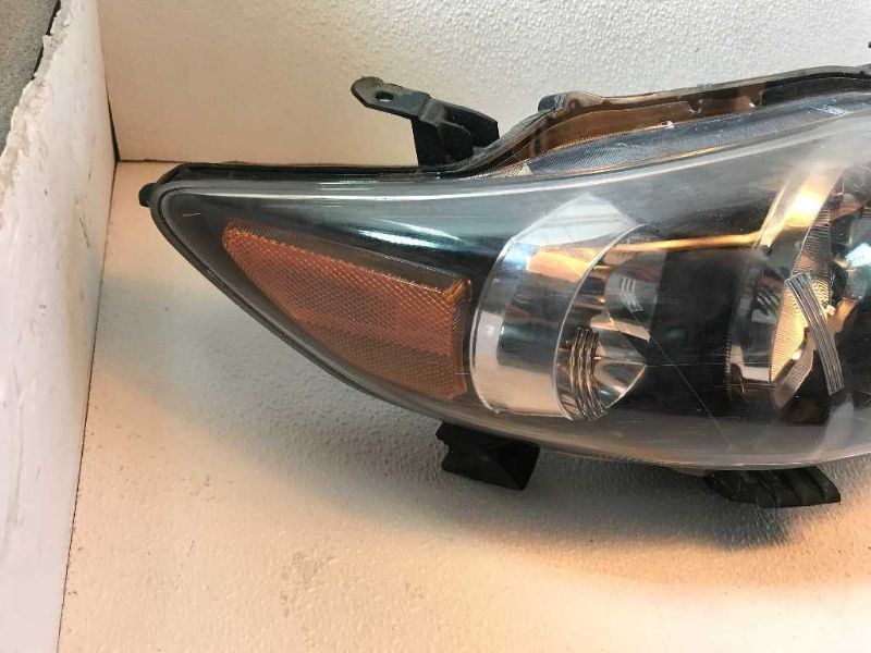 Right headlamp assembly composite used genuine OEM Toyota Corolla 2009-2010
