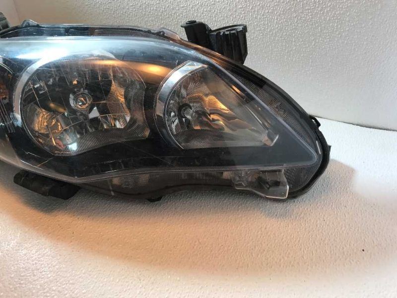 Right headlamp assembly composite used genuine OEM Toyota Corolla 2009-2010