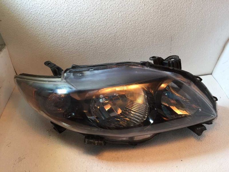 Right headlamp assembly composite used genuine OEM Toyota Corolla 2009-2010