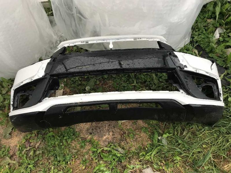 Defensa (parachoques) delantera usada original (OEM) Mitsubishi Outlander Sport 2016
