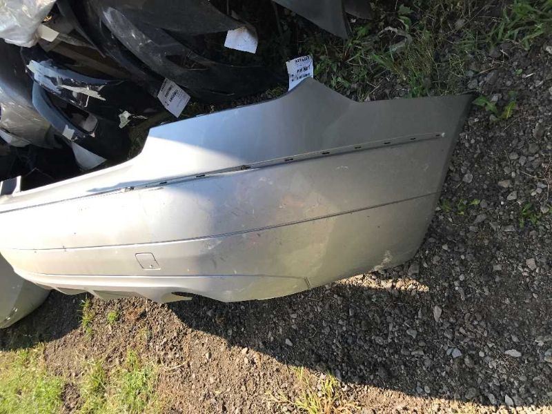 Rear bumper cover used genuine OEM Mercedes-Benz C230 2003-2007