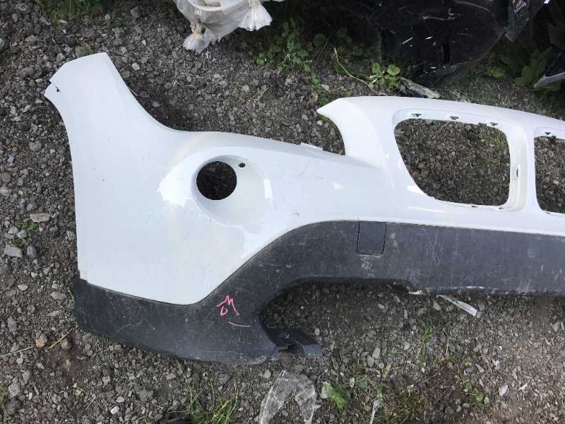 Defensa (parachoques) delantera usada original (OEM) BMW BMW X1 2012