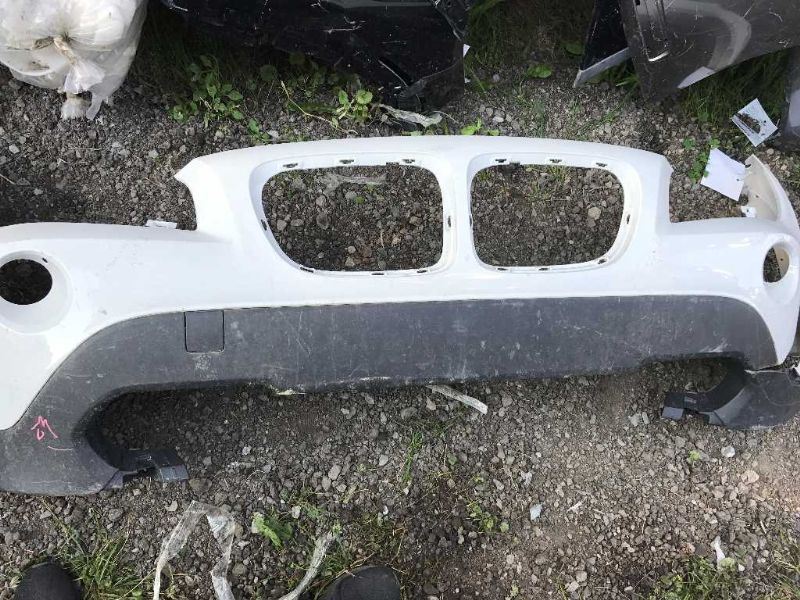 Defensa (parachoques) delantera usada original (OEM) BMW BMW X1 2012