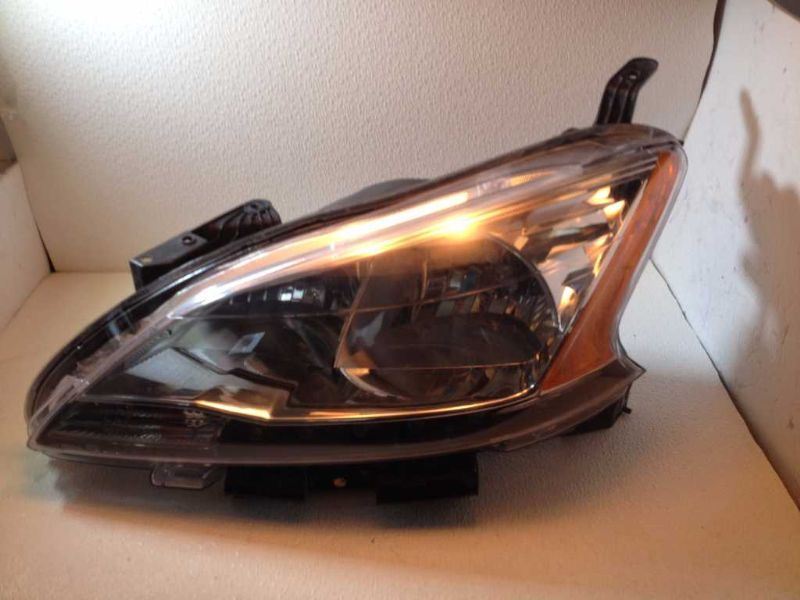 Left headlamp assembly composite used genuine OEM Nissan Sentra 2013-2015
