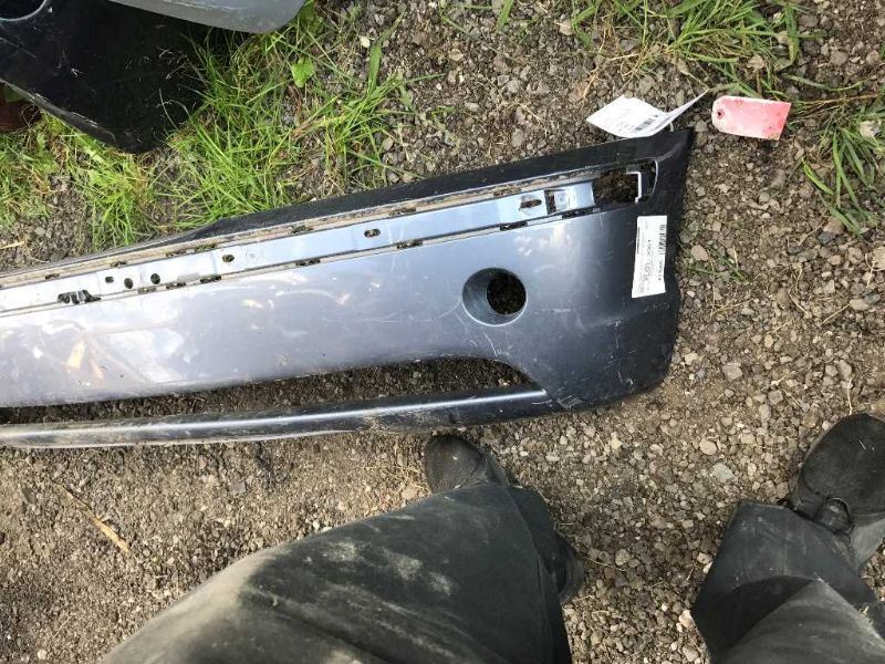 Front bumper cover used genuine OEM BMW 325I 2002-2005