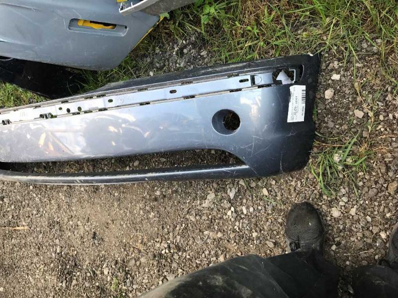 Front bumper cover used genuine OEM BMW 325I 2002-2005