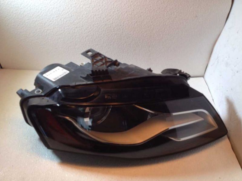 Headlamp Assembly used genuine OEM Audi Audi A4 2009-2012