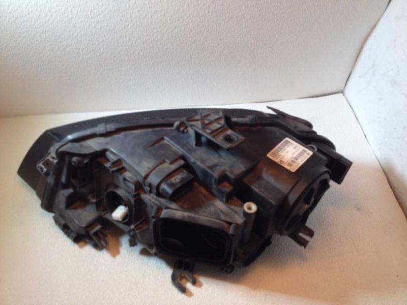 Headlamp Assembly used genuine OEM Audi Audi A4 2009-2012